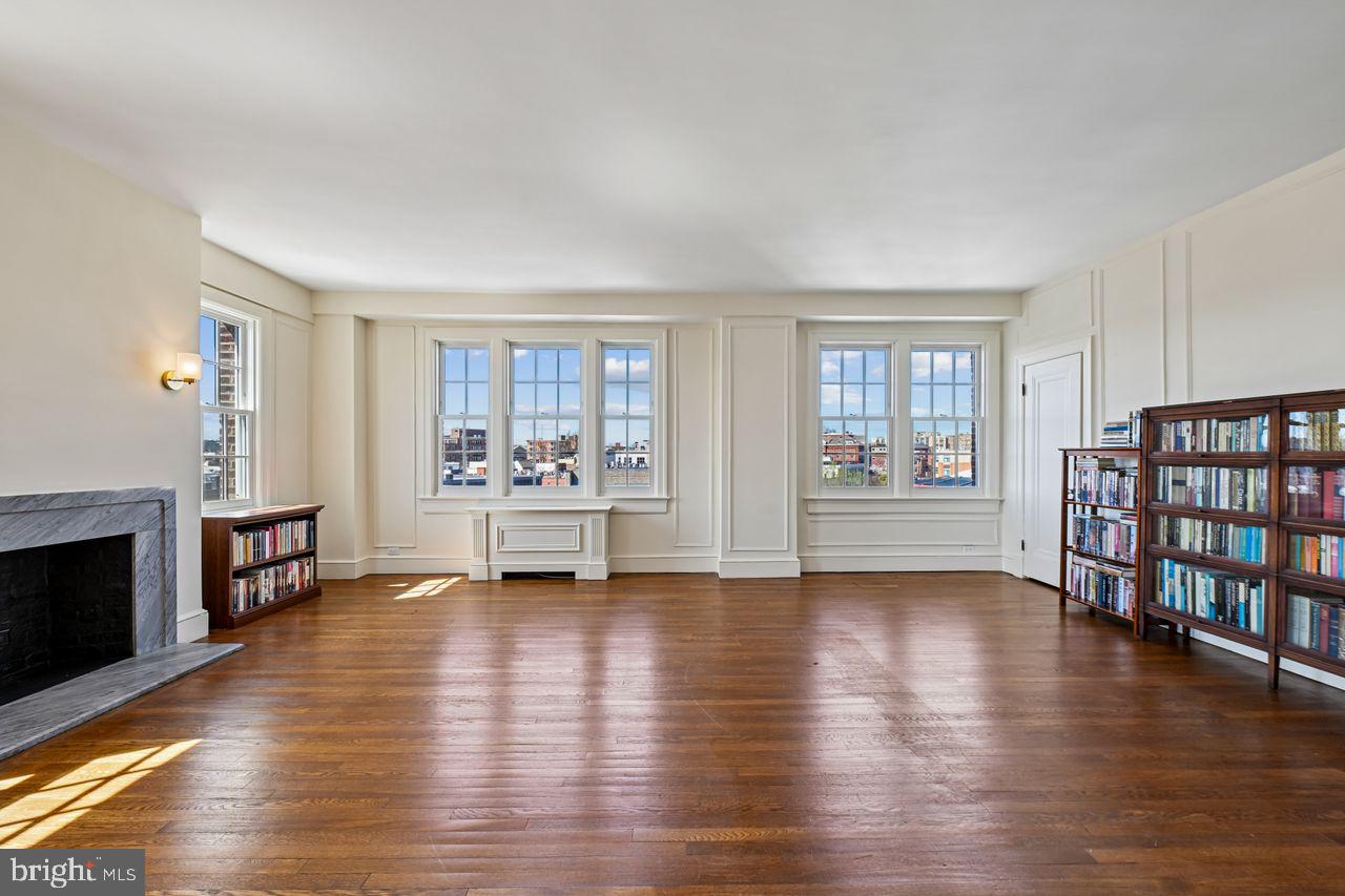 1661 Crescent Place Northwest, Unit 502 Washington, DC 20009 - Photo 21 of 50 a view of a living room with furniture and wooden floor