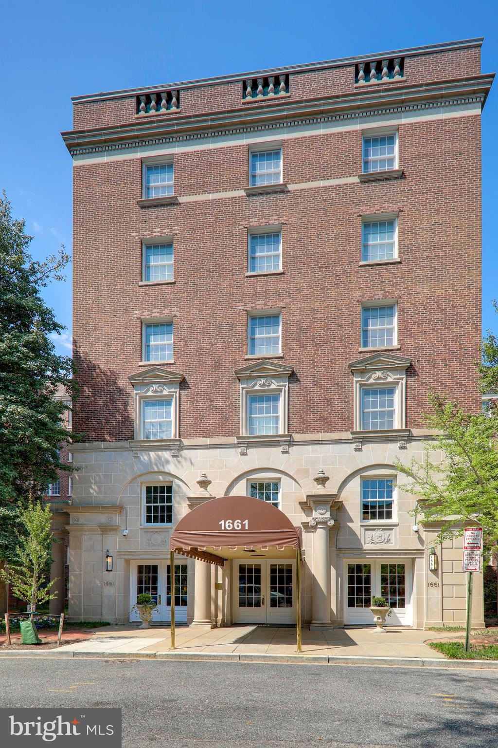 1661 Crescent Place Northwest, Unit 502 Washington, DC 20009 - Photo 50 of 50 a front view of a building with a yard