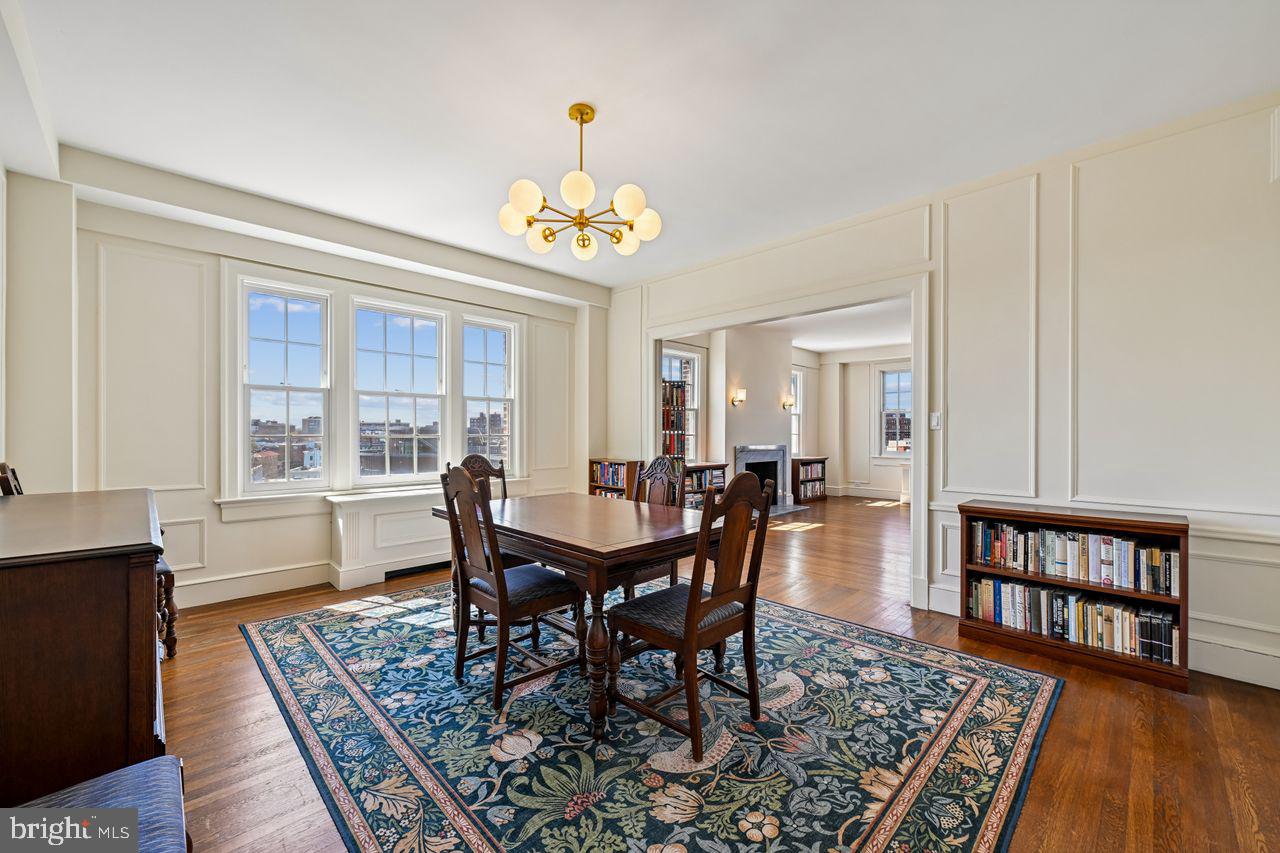 1661 Crescent Place Northwest, Unit 502 Washington, DC 20009 - Photo 6 of 50 a view of a dining room with furniture window and wooden floor