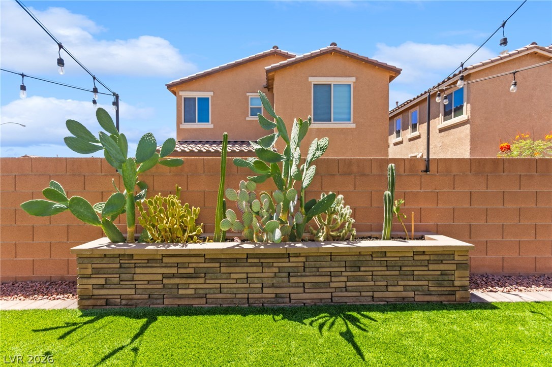 6435 Point Isabel Way Las Vegas, NV 89122 - Photo 47 of 57 Cultivated desert landscaping offers a low-maintenance, drought-tolerant yard design.