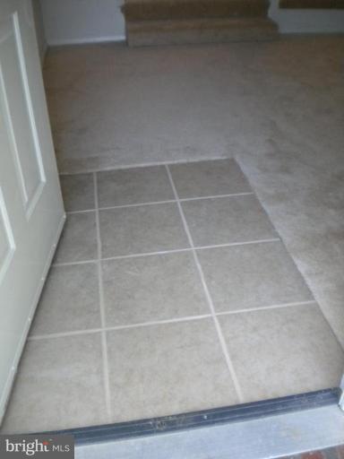 701 Riley Court Westminster, MD 21158 - Photo 8 of 11 New tile foyer...coat closet behind door