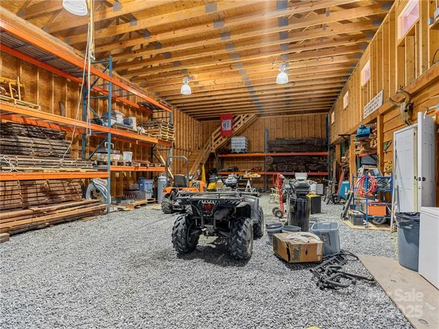 a view of a patio with table and chairs