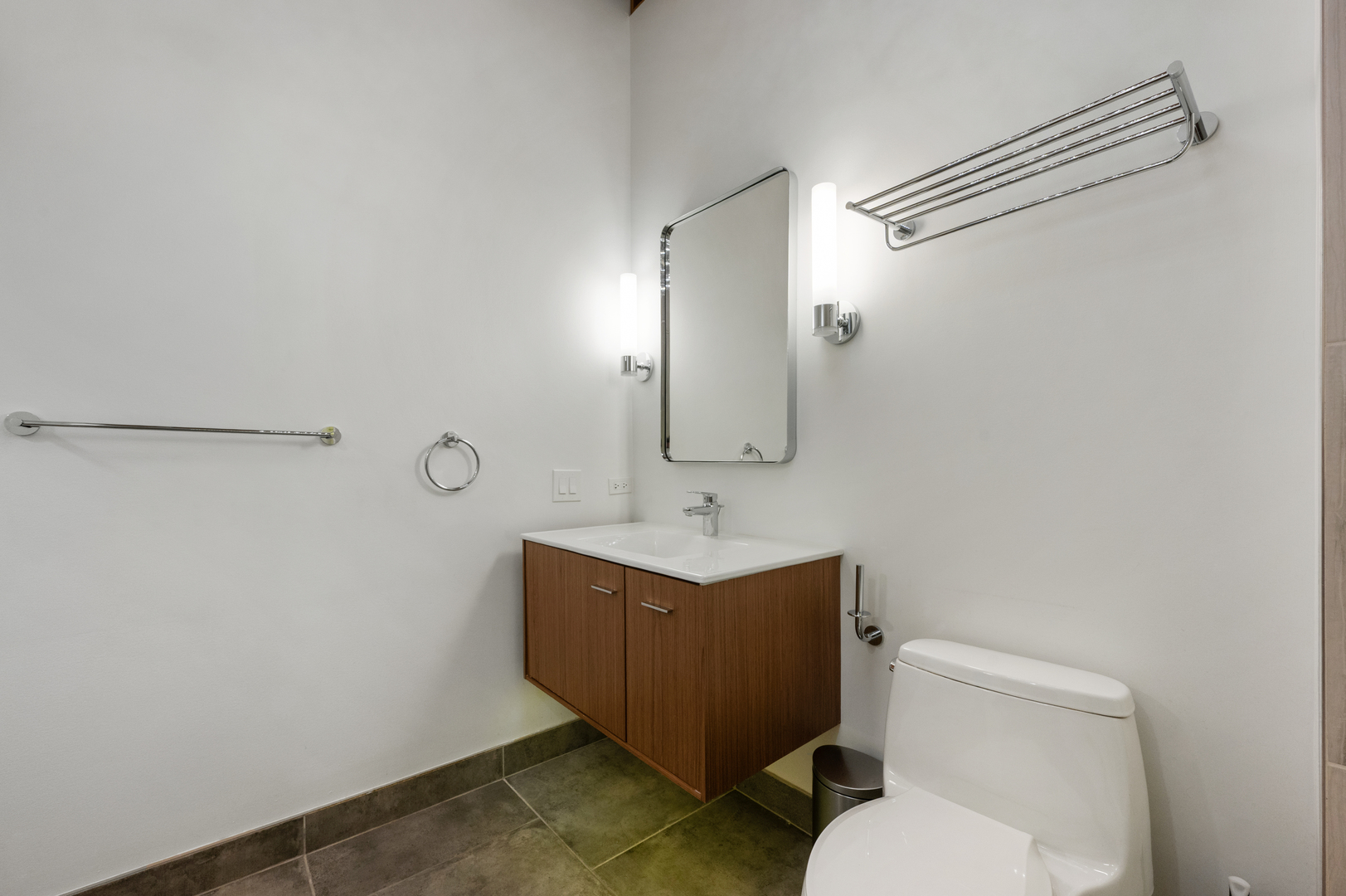 400 South Green Street, Unit 406 Chicago, IL 60607 - Photo 14 of 19 a bathroom with a toilet sink and mirror