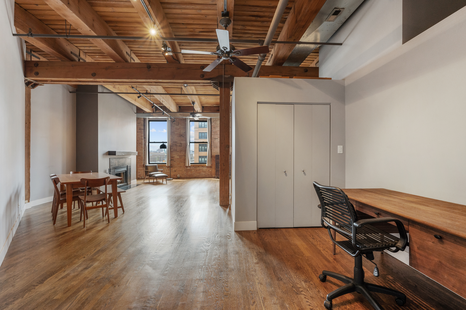 400 South Green Street, Unit 406 Chicago, IL 60607 - Photo 4 of 19 a view of a room with wooden floor and furniture
