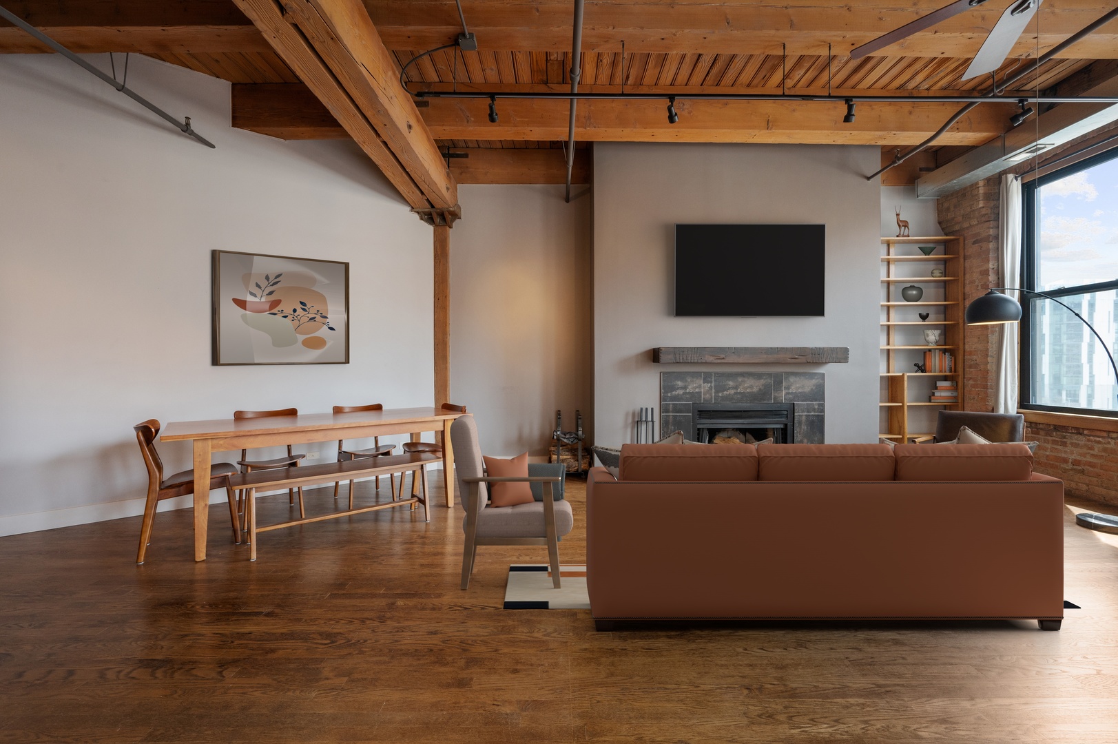 400 South Green Street, Unit 406 Chicago, IL 60607 - Photo 5 of 19 a living room with furniture a flat screen tv and a fireplace