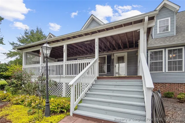a porch with seating space