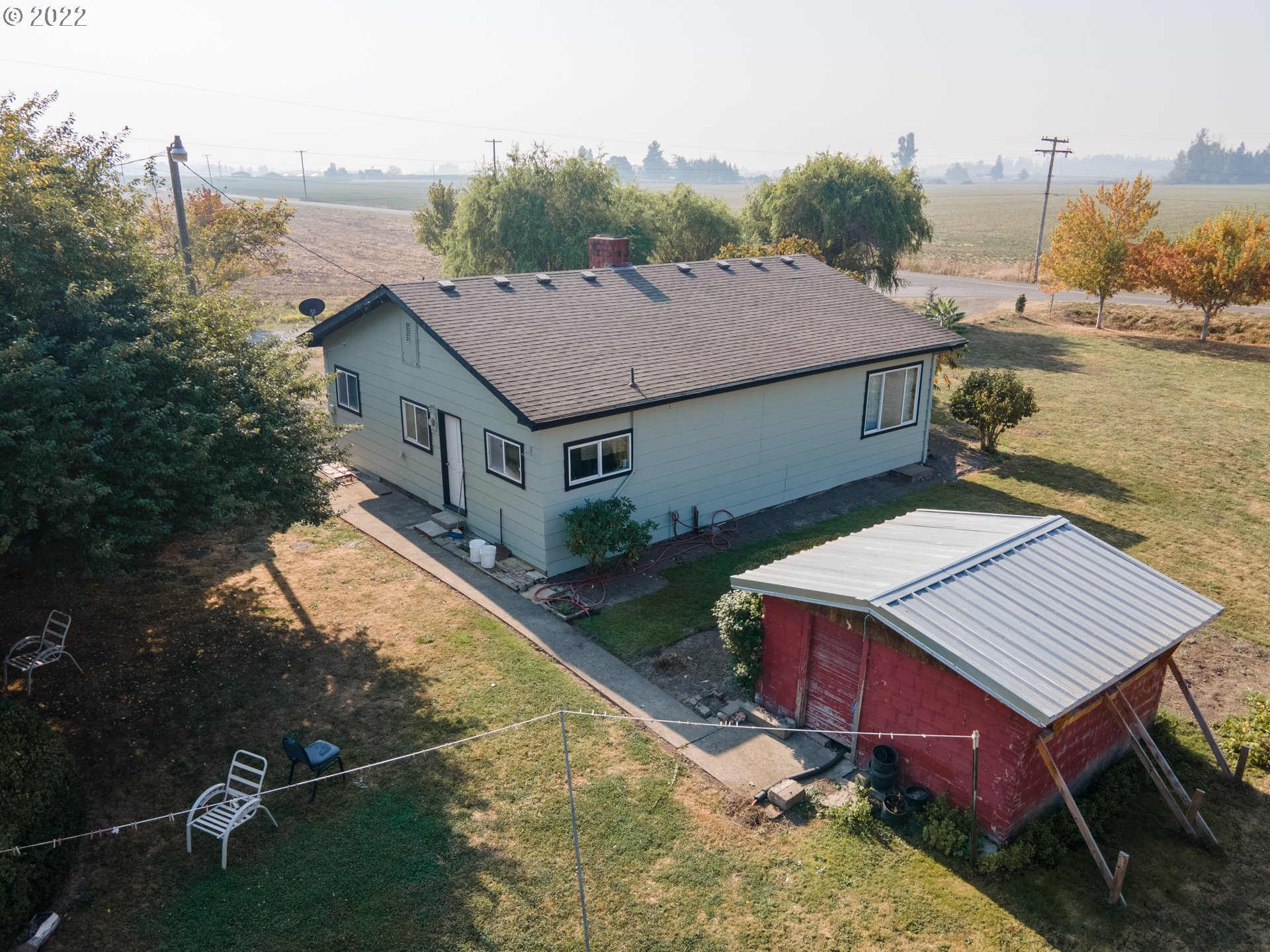 22902 Schultz Road Northeast Aurora, OR 97002 - Photo 18 of 20 an aerial view of a house having yard