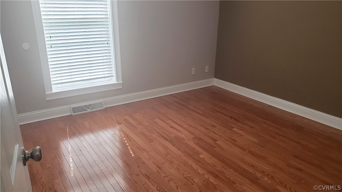0 Green Bay Road Rice, VA 23966 - Photo 13 of 32 an empty room with wooden floor and windows