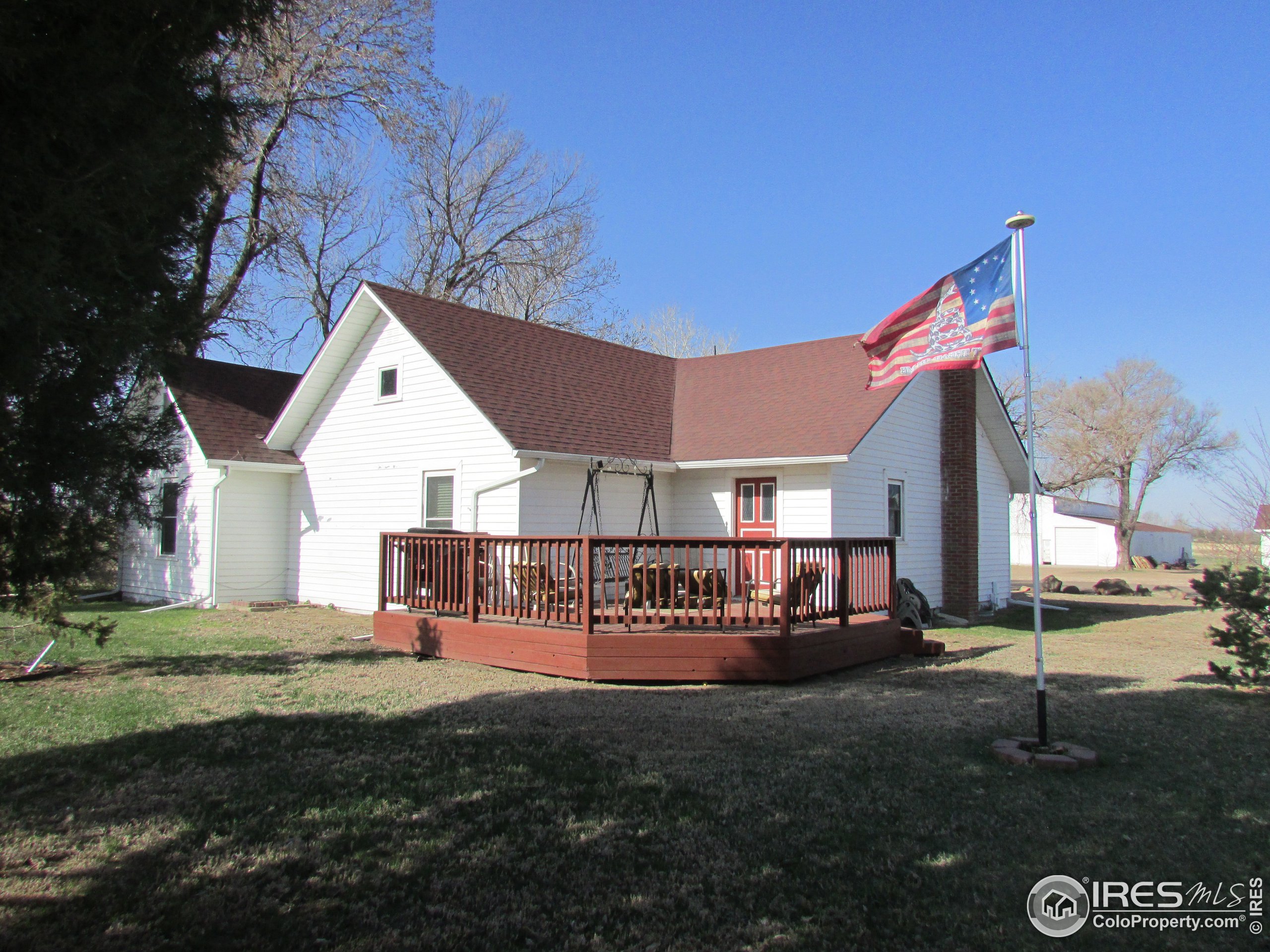3669 County Road 45 Hudson, CO 80642 - Photo 1 of 25 a view of a house with a yard