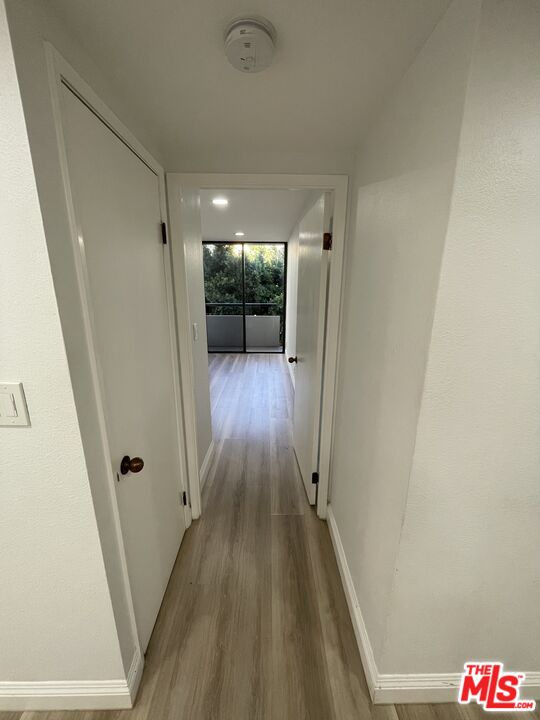 600 West 9th Street, Unit 316 Los Angeles, CA 90015 - Photo 12 of 29 a view of a hallway