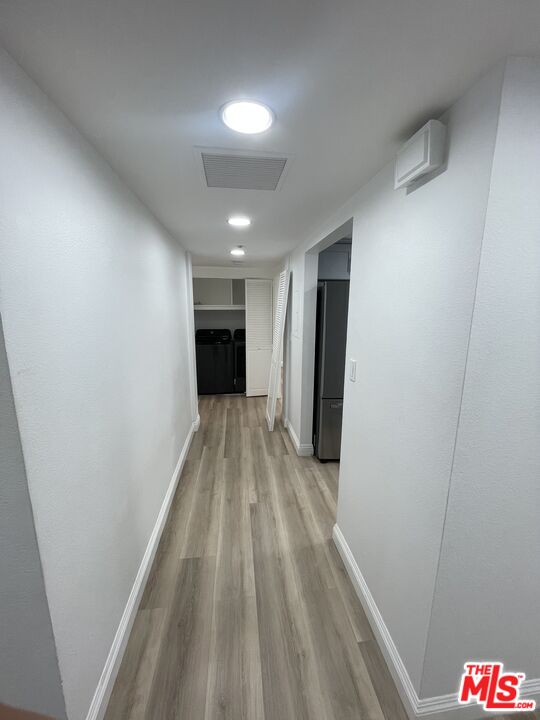 600 West 9th Street, Unit 316 Los Angeles, CA 90015 - Photo 17 of 29 a view of a hallway