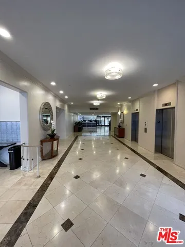 a lobby with furniture and a couch