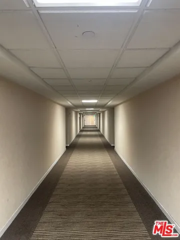 a view of hallway with a window