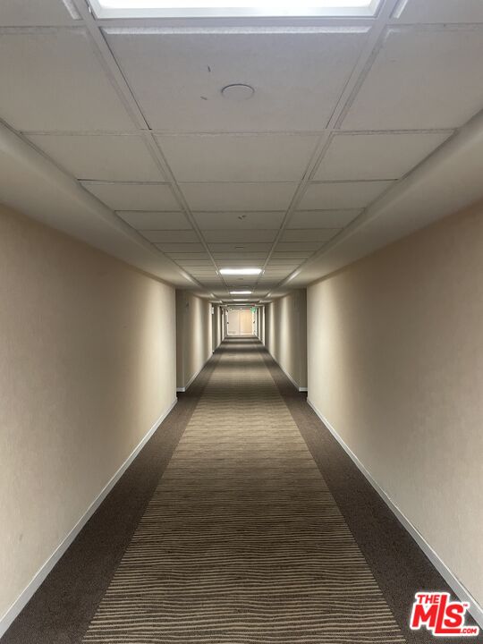 600 West 9th Street, Unit 316 Los Angeles, CA 90015 - Photo 4 of 29 a view of hallway with a window
