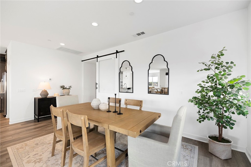 32151 Everview Terrace Temecula, CA 92591 - Photo 12 of 39 a view of a dining room with furniture and window
