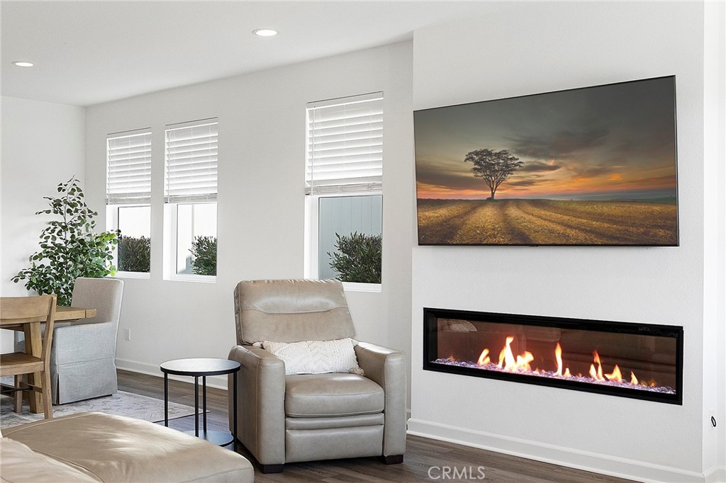 32151 Everview Terrace Temecula, CA 92591 - Photo 14 of 39 a living room with furniture and a fireplace
