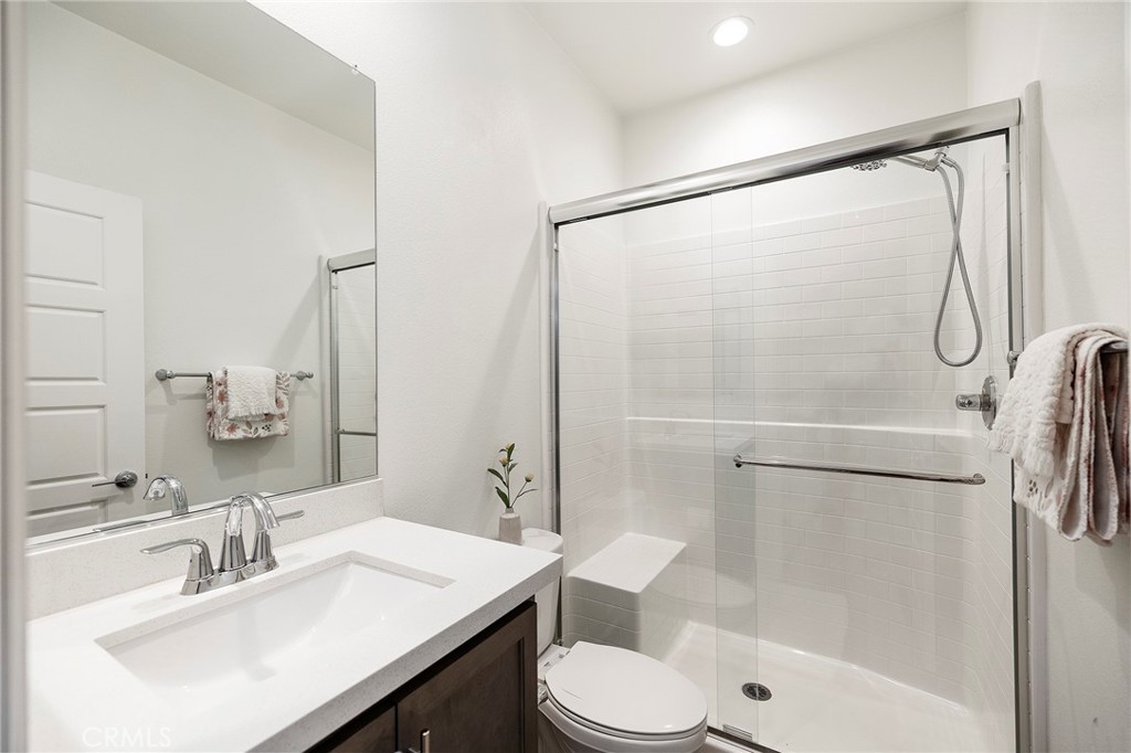 32151 Everview Terrace Temecula, CA 92591 - Photo 20 of 39 a bathroom with a sink toilet and shower