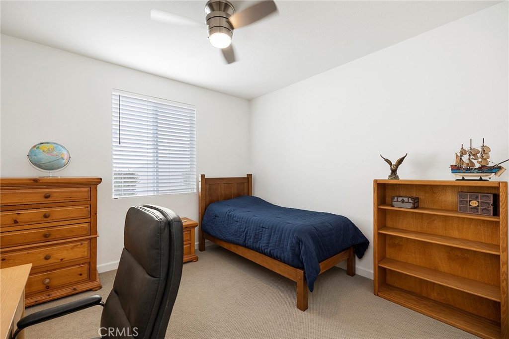 32151 Everview Terrace Temecula, CA 92591 - Photo 23 of 39 a bedroom with a bed and furniture