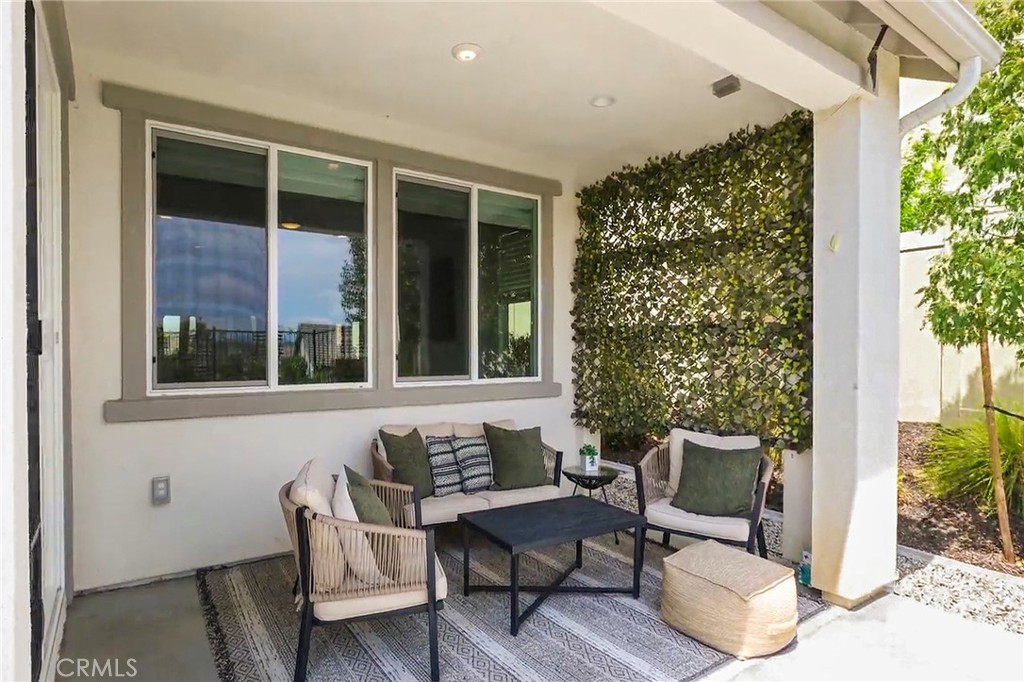32151 Everview Terrace Temecula, CA 92591 - Photo 30 of 39 a balcony with furniture and a potted plant