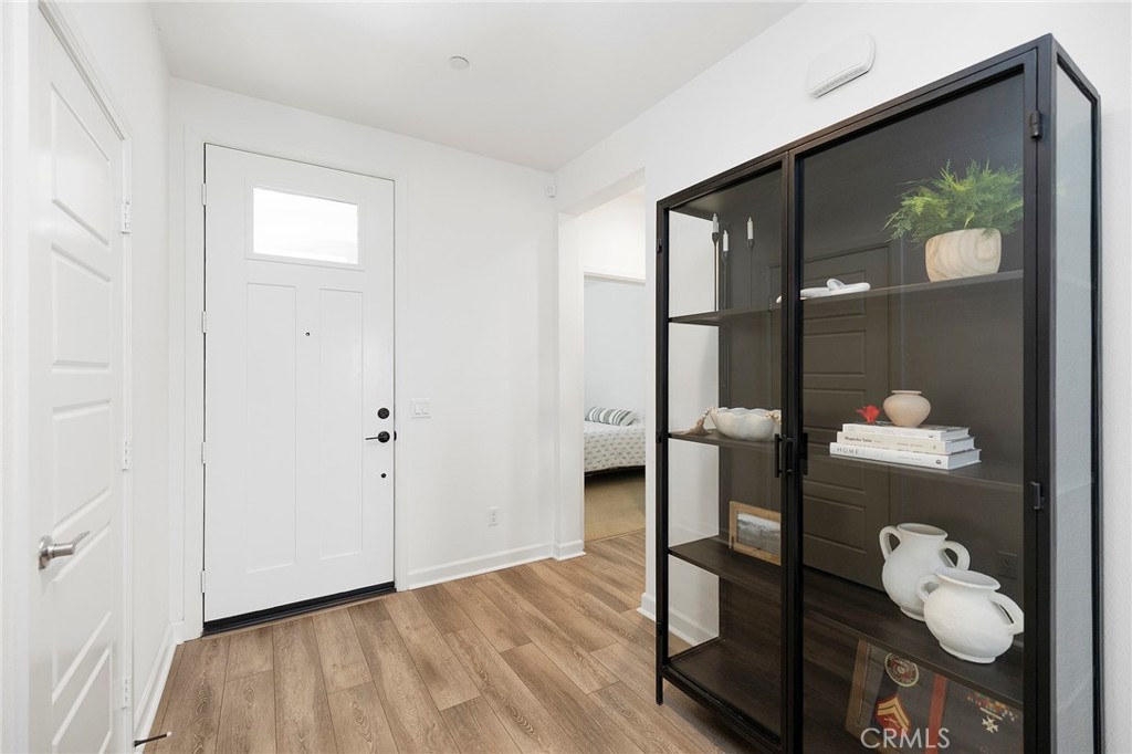 32151 Everview Terrace Temecula, CA 92591 - Photo 3 of 39 a view of livingroom with furniture and wooden floor