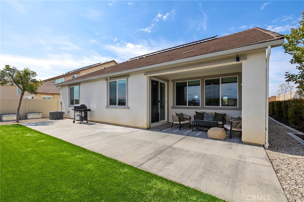 32151 Everview Terrace Temecula, CA 92591 - Photo 31 of 39 a view of a backyard with sitting area and furniture
