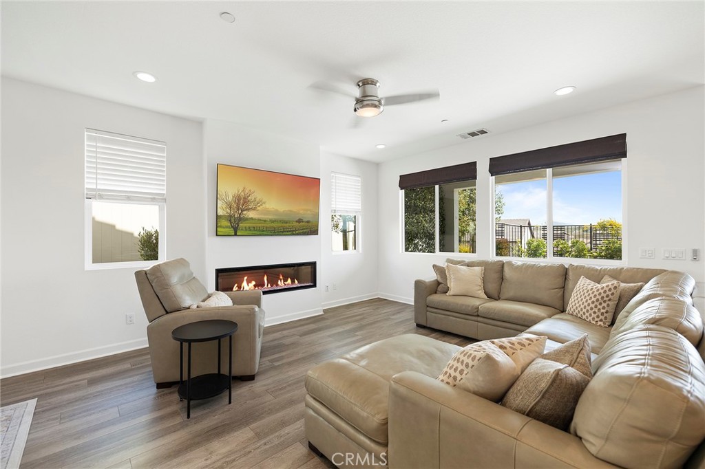 32151 Everview Terrace Temecula, CA 92591 - Photo 10 of 39 a living room with furniture and a large window