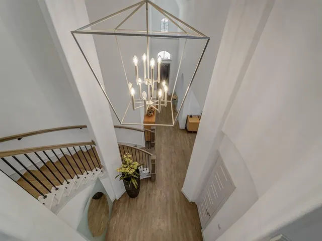 a room with gym equipment and a flat screen tv