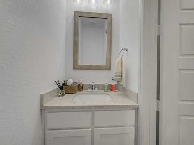 a bedroom with a bed and closet