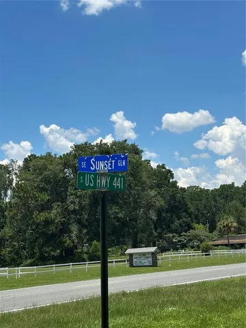 a view of a house with a big yard