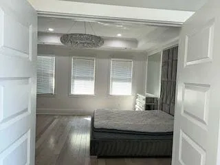 a view of a bathroom with a sink a mirror and a shower