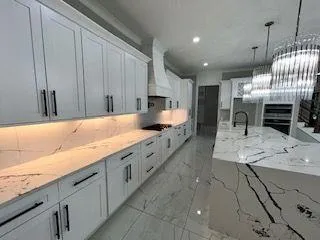 a large kitchen with cabinets