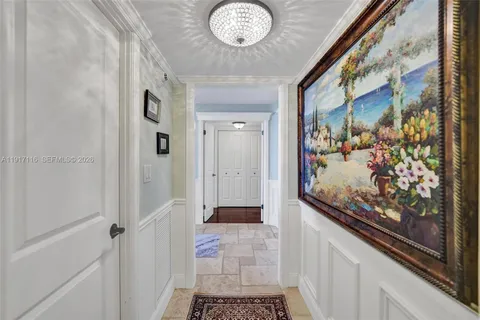 a bathroom with a toilet a sink and shower