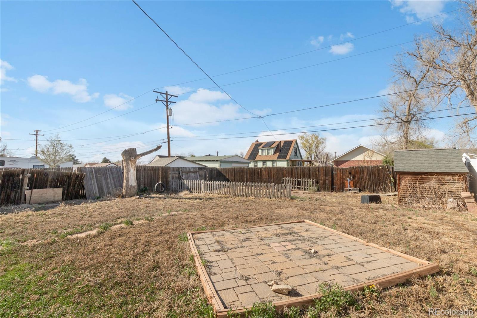 229 4th Street Fort Lupton, CO 80621 - Photo 20 of 25 a view of a backyard