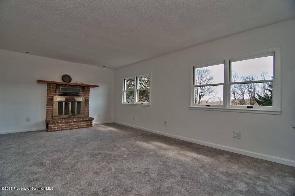3585 Hornbaker Cemetary Road Moscow, PA 18444 - Photo 13 of 46 a view of empty room with windows