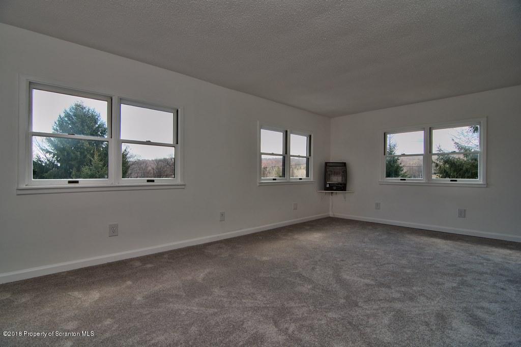 3585 Hornbaker Cemetary Road Moscow, PA 18444 - Photo 15 of 46 an empty room with windows
