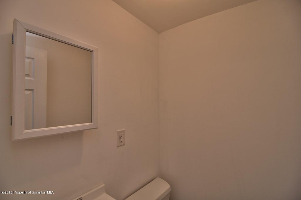 3585 Hornbaker Cemetary Road Moscow, PA 18444 - Photo 28 of 46 a bathroom with a toilet