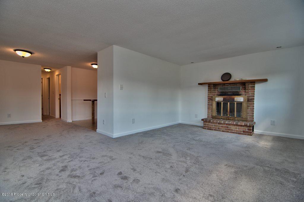 3585 Hornbaker Cemetary Road Moscow, PA 18444 - Photo 3 of 46 a view of empty room with a fireplace