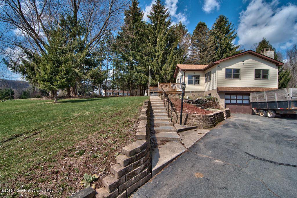 3585 Hornbaker Cemetary Road Moscow, PA 18444 - Photo 42 of 46 a view of a house with backyard and trees