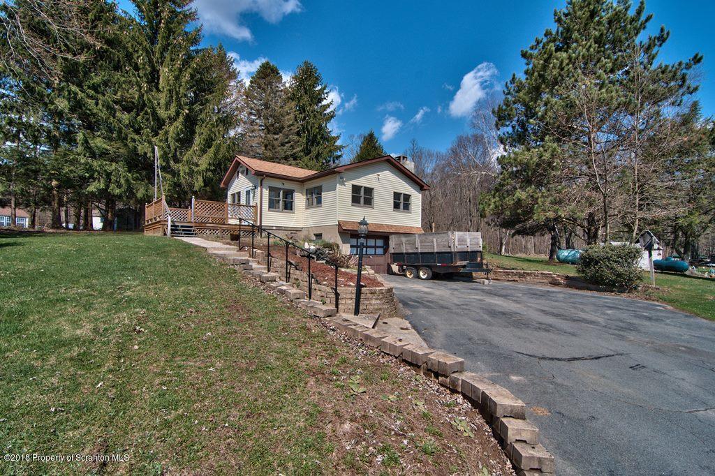3585 Hornbaker Cemetary Road Moscow, PA 18444 - Photo 10 of 46 a view of a house with a yard