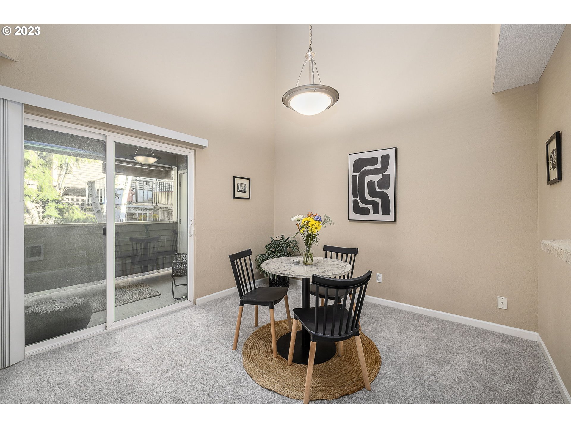 10178 Southeast Talbert Street Clackamas, OR 97015 - Photo 11 of 32 a dining room with furniture and window
