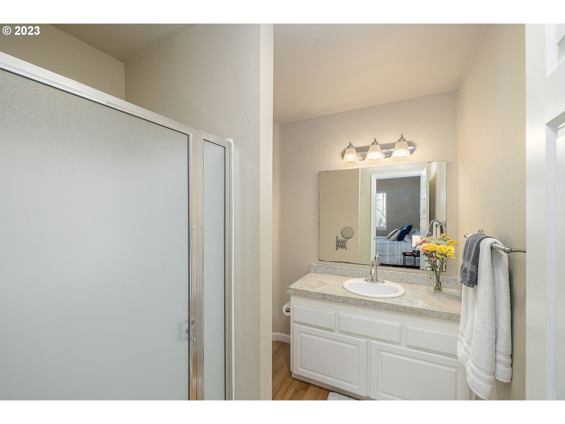 10178 Southeast Talbert Street Clackamas, OR 97015 - Photo 20 of 32 a bathroom with a sink and a mirror