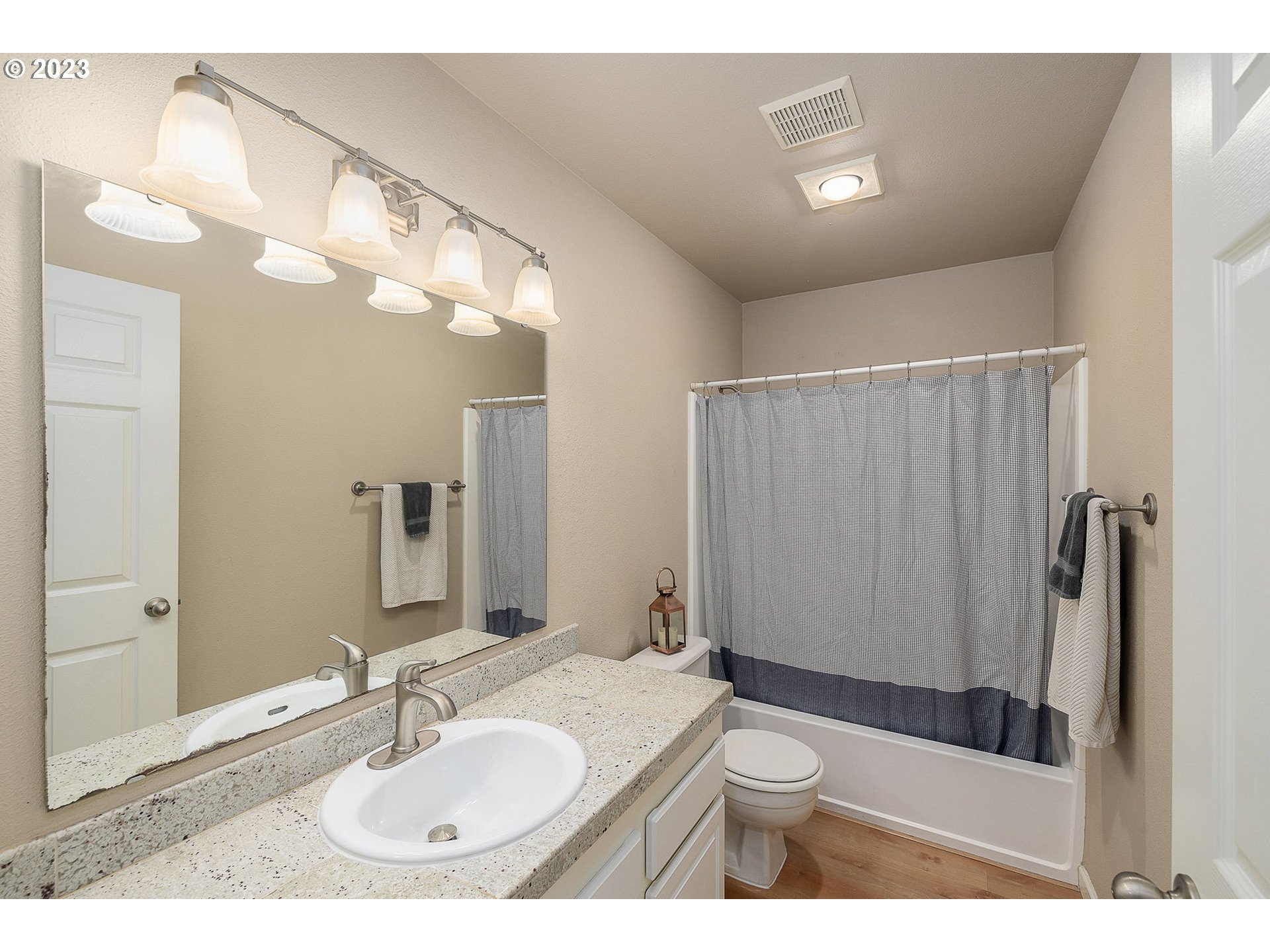 10178 Southeast Talbert Street Clackamas, OR 97015 - Photo 21 of 32 a bathroom with a sink a toilet and shower