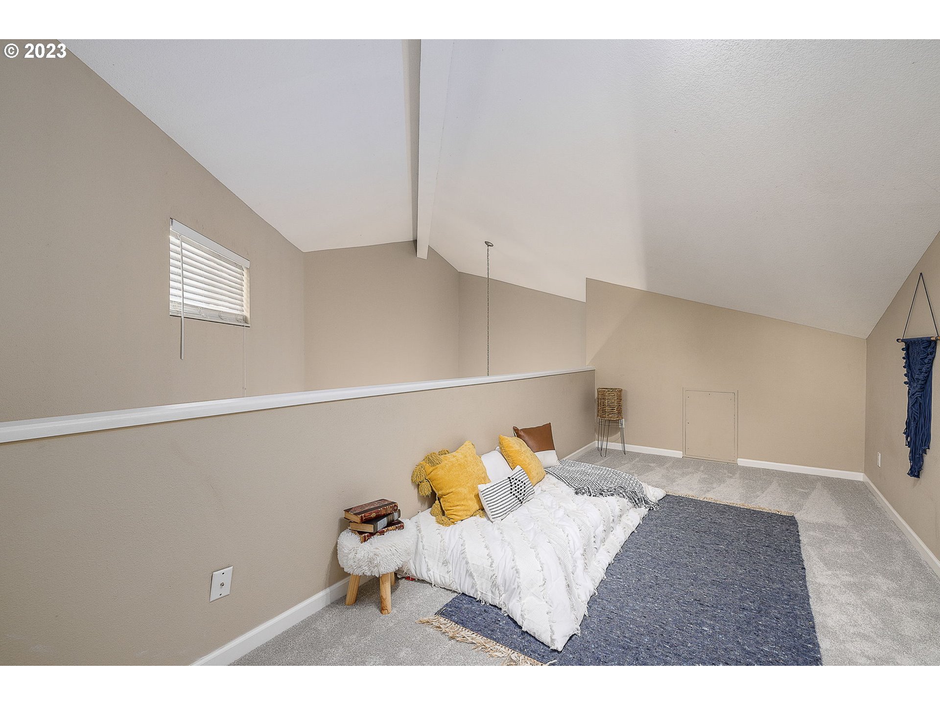 10178 Southeast Talbert Street Clackamas, OR 97015 - Photo 25 of 32 a bedroom with a bed and cabinets