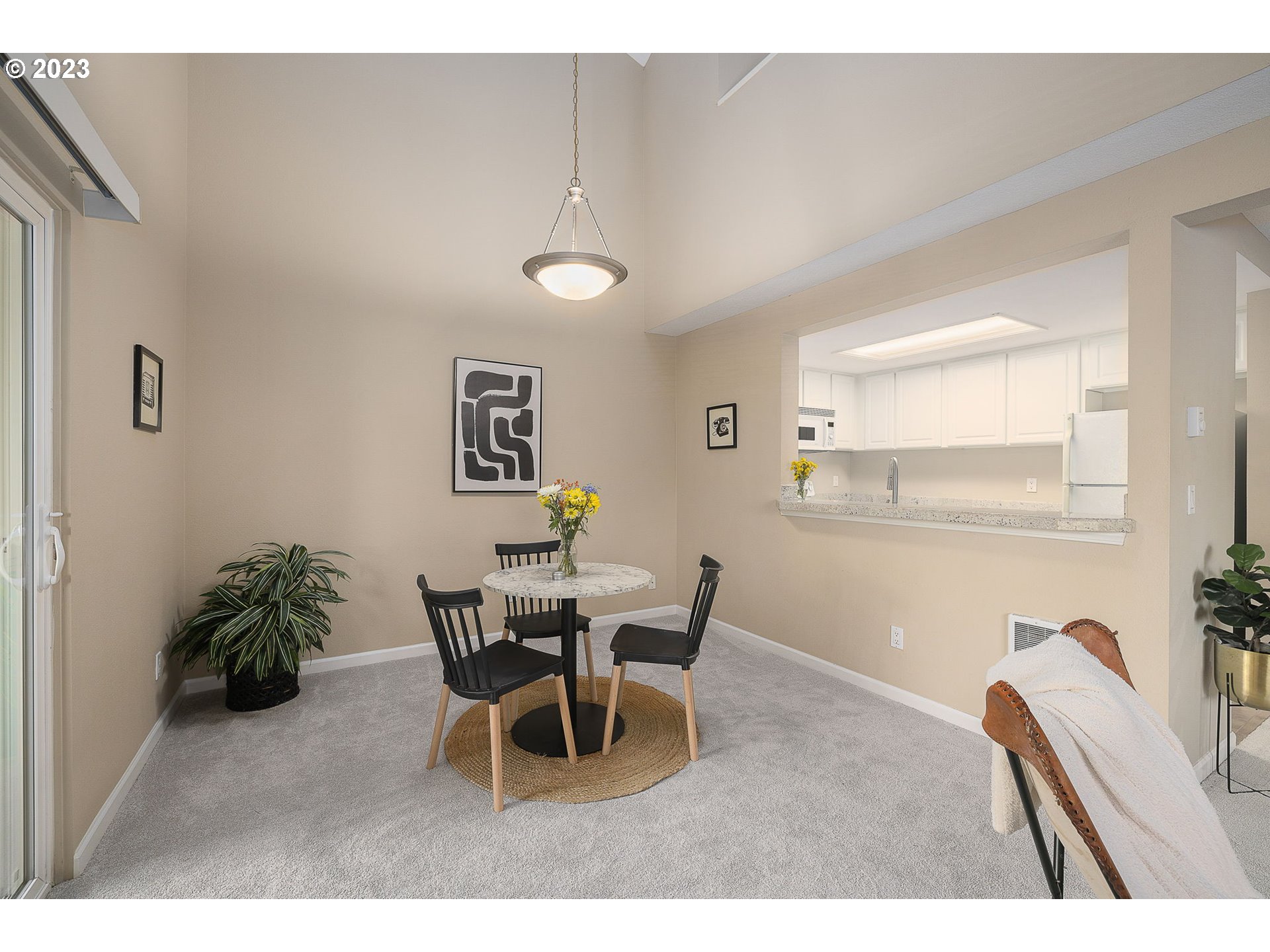 10178 Southeast Talbert Street Clackamas, OR 97015 - Photo 10 of 32 a dining room with furniture and window