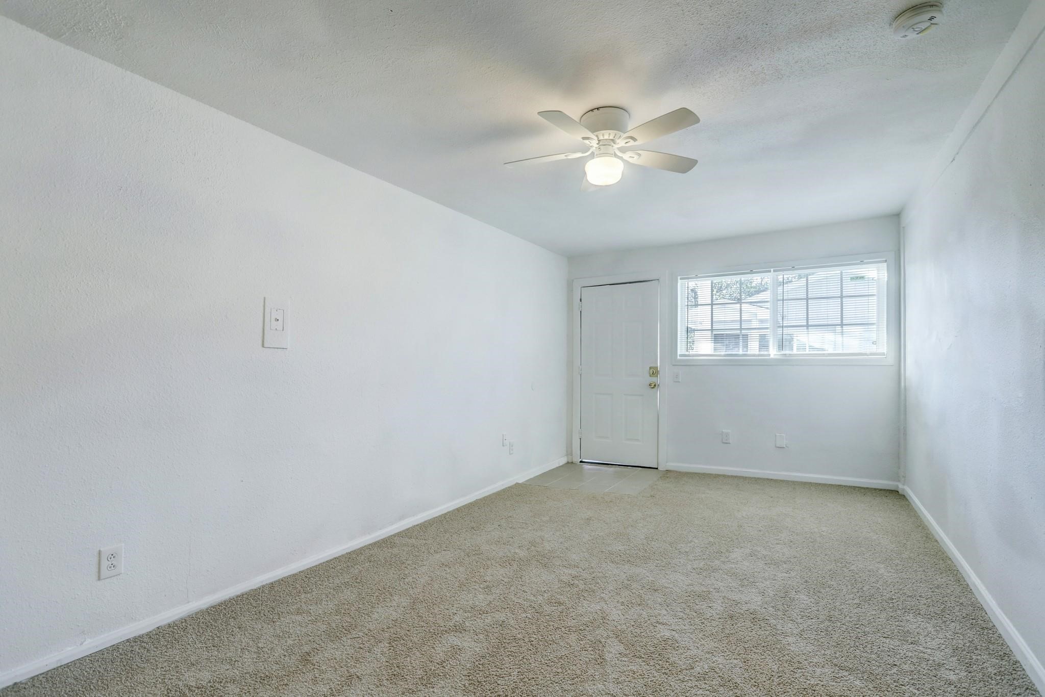 3823 Lydia Street Houston, TX 77021 - Photo 11 of 20 a view of an empty room with a window