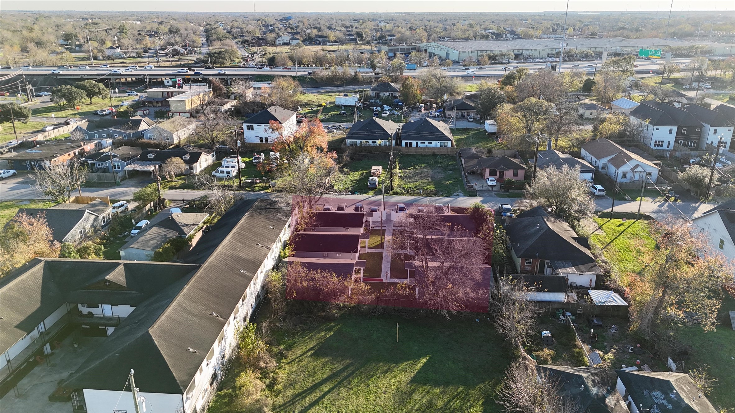 3823 Lydia Street Houston, TX 77021 - Photo 3 of 20 an aerial view of a house with a garden and lake view