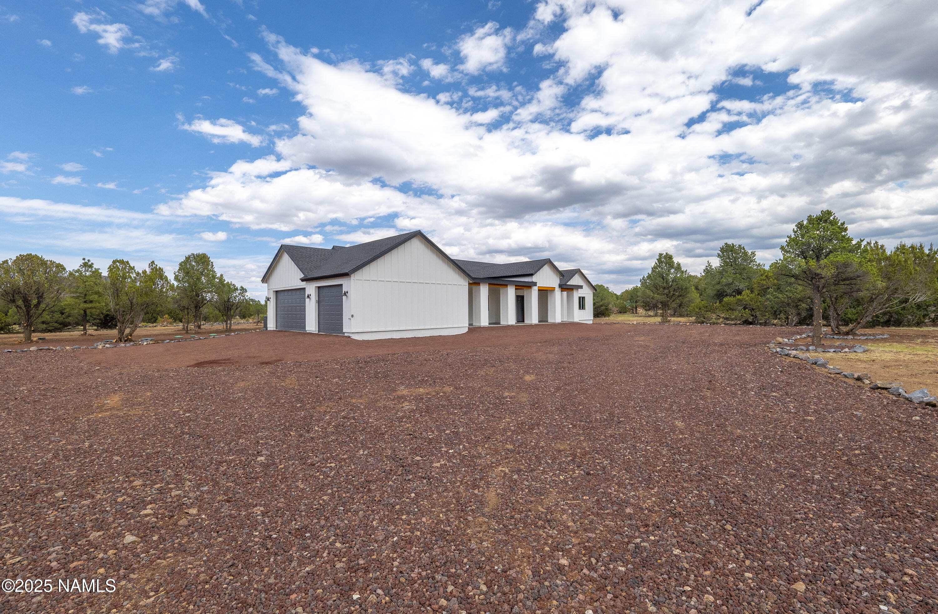 7935 North Red Lake Road Williams, AZ 86046 - Photo 22 of 31 a view of house with yard and street view