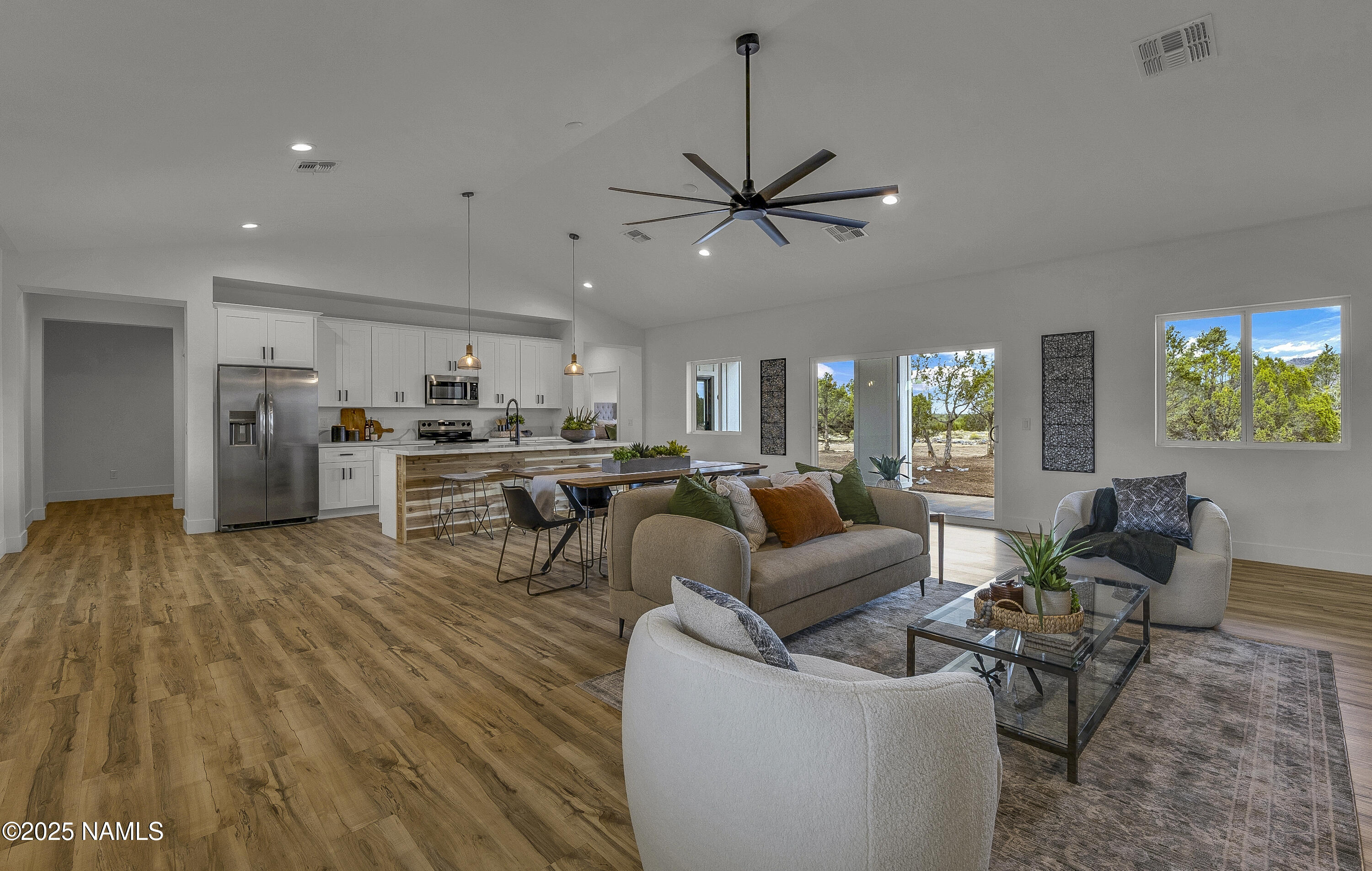 7935 North Red Lake Road Williams, AZ 86046 - Photo 4 of 31 a living room with furniture and a wooden floor