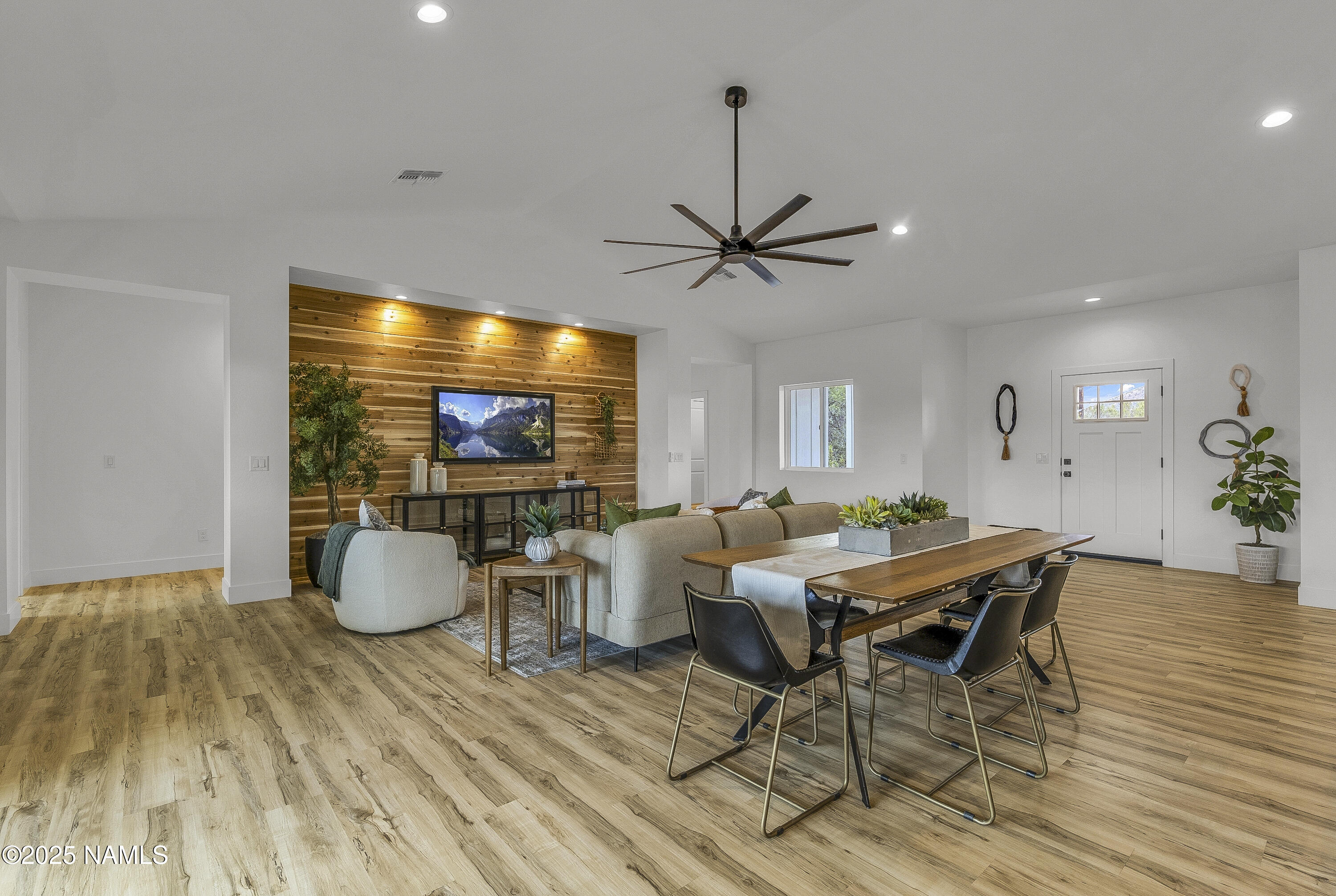 7935 North Red Lake Road Williams, AZ 86046 - Photo 10 of 31 a living room with furniture and a flat screen tv