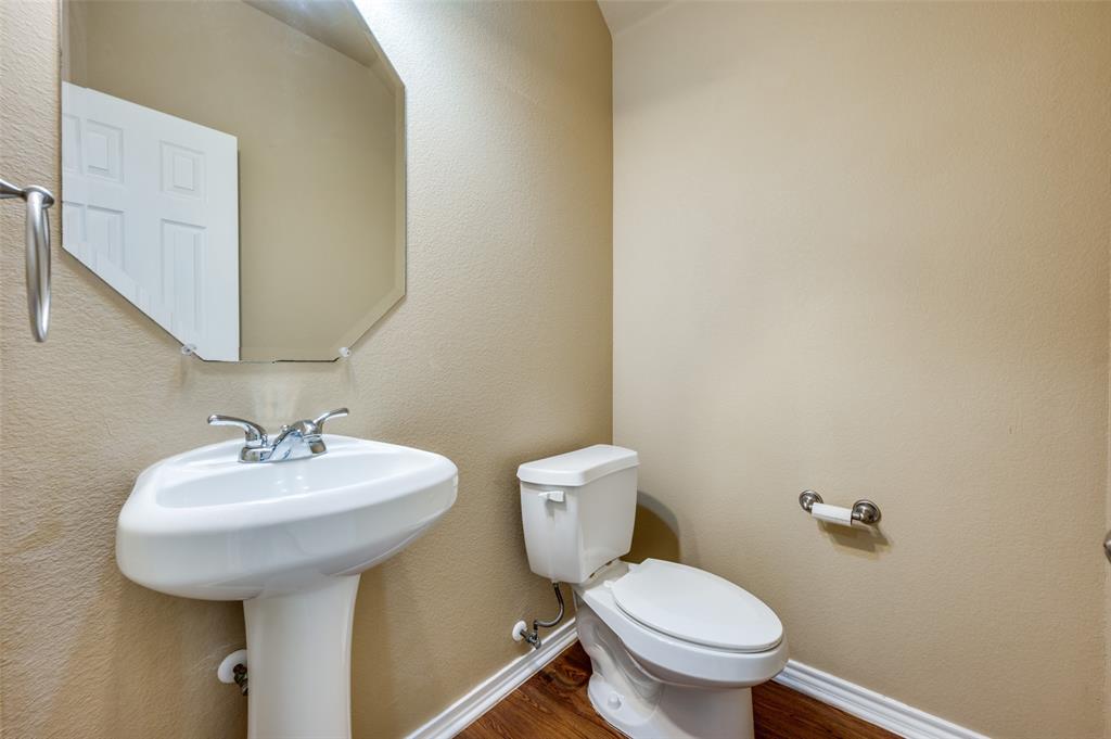 430 Woodgrove Drive, Unit A & B Little Elm, TX 75068 - Photo 9 of 20 a bathroom with a sink and a toilet